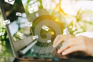 Woman hand using smartphone to send and recieve email for business