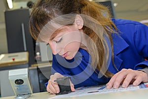 Woman hand using stamper on document