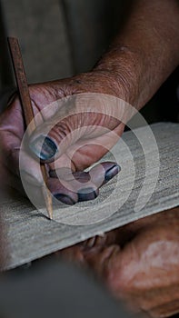 Woman hand was weaving craft work in SAPA, Vietnam