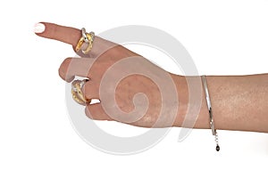 Woman hand wearing silver Snake Chain bracelet and Interlocked Golden and Silver Rings set against a white background. Beautiful