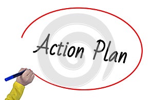 Woman hand writing action plan with marker