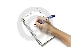 Woman hand writing with pen on notebook