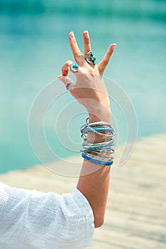 Woman hand in yoga symbolic gesture mudra