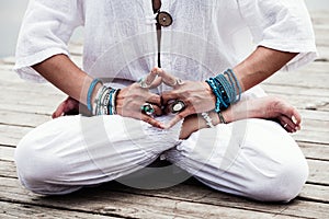 Woman hand in yoga symbolic gesture mudra