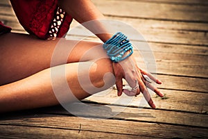Woman hand in yoga symbolic gesture mudra outdoor