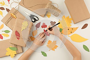 Woman handcrafting autumn gifts