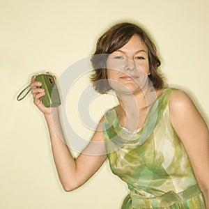 Woman with handheld radio.