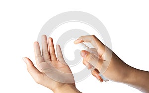 woman handing alcohol disinfectant spray bottle and spraying on hand isolated on white background