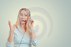 Woman hands in air aggravated talking on headset