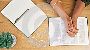 Woman hands, bible and prayer in top view of spiritual faith, holy gospel and trust to worship God. Closeup of person