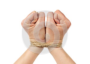 Woman hands bound by rope or string isolated on white