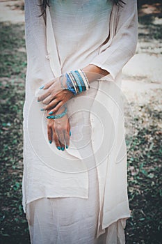 Woman hands with bracelets