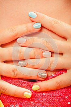 Woman hands with color nail polish. Manicure.
