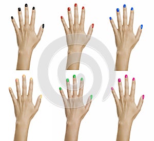 Woman hands with colorful nail varnish photo