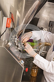 Woman hands the controls of a modern machine