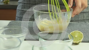 Woman Hands Cooking Souffle Pancakes dessert set.