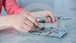 Woman Hands Counting 100 Dollar Banknotes