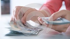 Woman hands counting money cash.