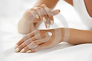 Woman Hands With Cream. Closeup Of Female Hands Applying Lotion