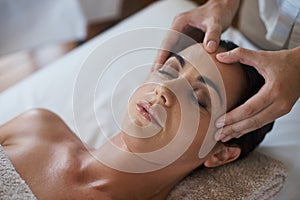 Woman, hands and facial massage for skin care, pamper and beauty therapy for spa treatment. Female person, destress and