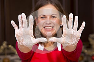 Woman and hands with flour