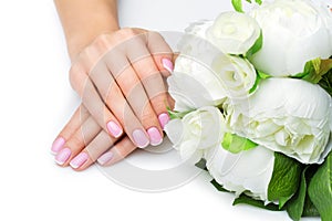 Woman hands with french manicure