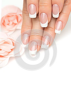 Woman hands with french manicure close up