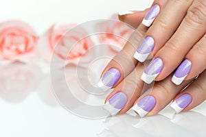 Woman hands with french manicure close up