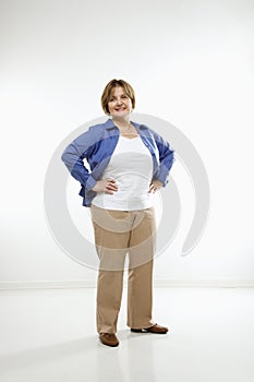 Woman with hands on hips. photo