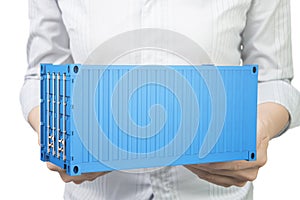 Woman hands holding 3d blue cargo container