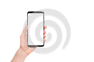 Woman hands holding the black smartphone blank screen with modern frameless design isolated on white background
