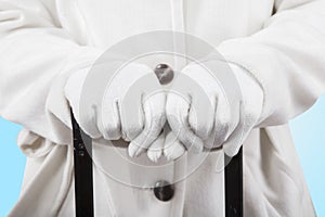 Woman hands holding a luggage handgrip