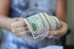 Woman hands holding money