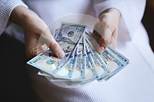 Woman hands holding money