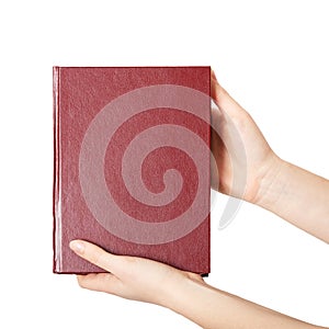 Woman hands holding red book