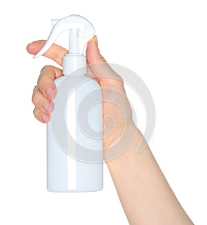 Woman hands holding a white spray bottle, isolated on transparent background close-up, template for cosmetics ads