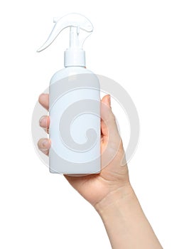 Woman hands holding a white spray bottle, isolated on transparent background close-up, template for cosmetics ads