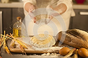 Woman hands kneading dough homemade ingredient