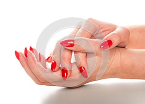 Woman hands with manicured red nails