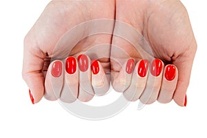 Woman hands with manicured red nails