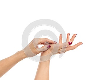 Woman hands with manicured red nails isolated