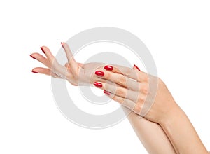 Woman hands with manicured red nails photo