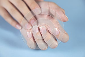 Woman hands and nails on the table