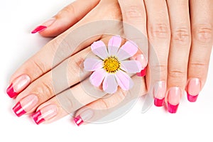 Woman hands with pink manicure
