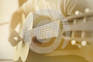 Woman hands playing acoustic classic guitar the musician of jazz and easy listening style select focus shallow depth of field