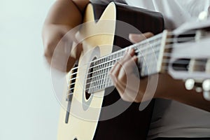 Woman hands playing acoustic classic guitar the musician of jazz and easy listening style select focus shallow depth of field and