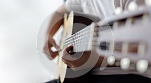 Woman hands playing acoustic classic guitar the musician of jazz and easy listening style select focus shallow depth of field with