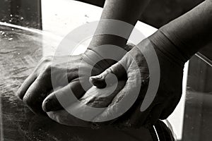 Woman hands preparing dough