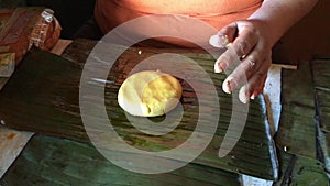 Woman hands preparing fresh christmas Venezuelan dish hallacas