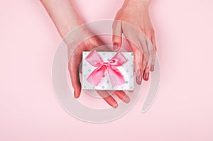Woman hands with present box